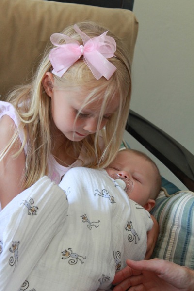 Holding a Sleeping Eli